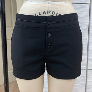 Black shorts. 3 ¾” inseam. Viscose blend.